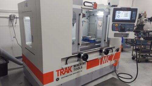 TRAK CNC milling machine with a digital control panel used for precision prototype machining.